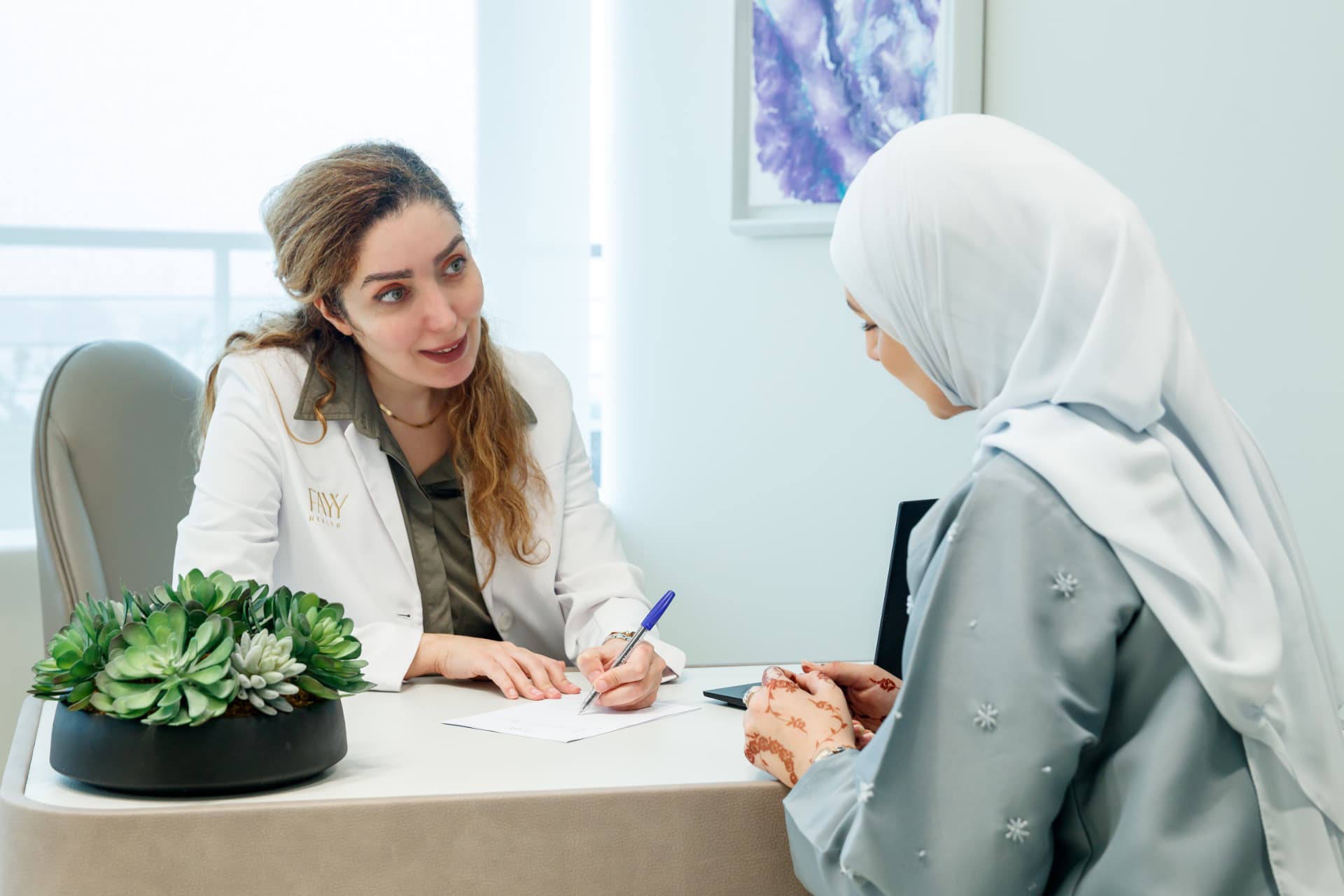 Confidential gynaecology consultation with Dr. Mahsa Aghaei in Dubai discussing hormonal health